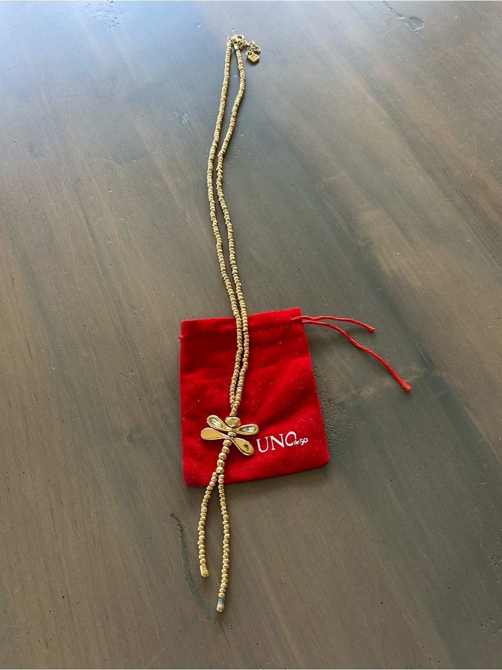 Necklace with dragonfly pendant by Uno de 50